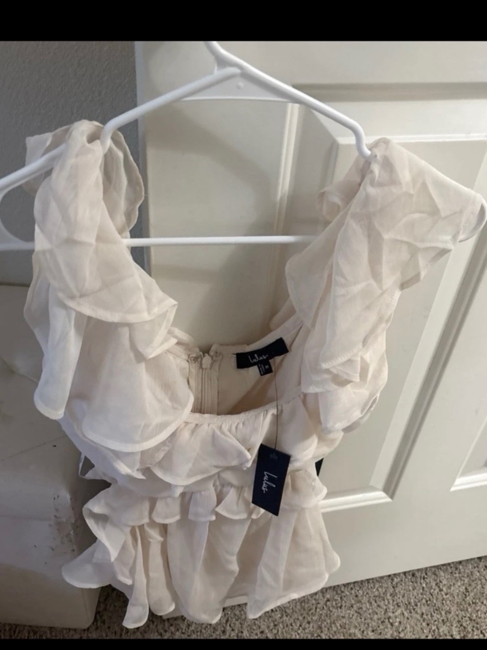 Lulus white flavorless blouse New with the tags size medium